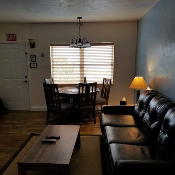 Captain Pip's Marina & Hideaway - Sofa and dining. Room has 2 TVS - Boating Near Me - Marathon, Florida