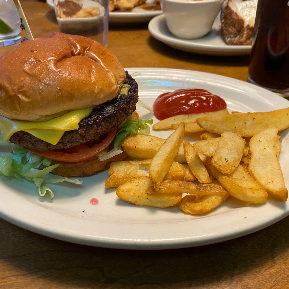 Texas Roadhouse - This has to be one of the thickest burgers I've seen. - Steakhouses Near Me - Littleton, Colorado Texas Roadhouse - This has to be one of the thickest burgers I've seen. - Steakhouses Near Me - Littleton, Colorado