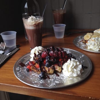 Zinneken's - Harvard Square - Liege waffle with berries, whipped cream, and chocolate. - Belgian Near Me - Cambridge, Massachusetts Zinneken's - Harvard Square - Liege waffle with berries, whipped cream, and chocolate. - Belgian Near Me - Cambridge, Massachusetts