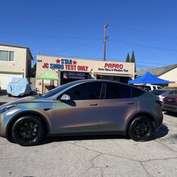 Tesla model Y wrap and tint Tesla model Y wrap and tint