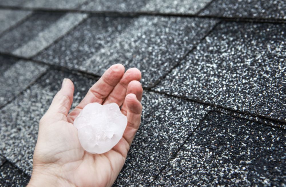 Slide of TM Roofing & Construction Group