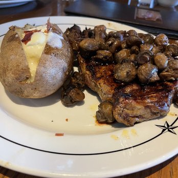 Saltgrass Steak House - Pat's 16 oz ribeye with sautéed mushrooms and loaded baked potato. Best ribeye I've ever had. - Steakhouses Near Me - Laughlin, Nevada