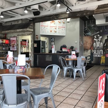 Slim Chickens - Restaurant seating. - Southern Near Me - Edmond, Oklahoma