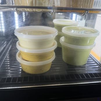 Don Pollo - Yellow and Green Sauces for sale.  Both yellow sauces are so good! - Peruvian Near Me - Mineola, New York