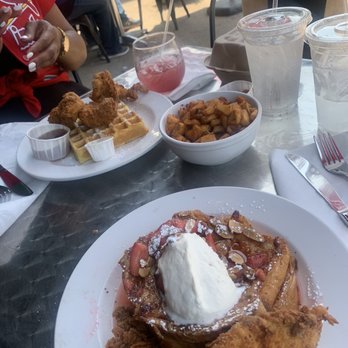 At The Corner - Chicken and waffles, breakfast potatoes, and their special at the time strawberry and lemon French toast - Salad Near Me - Little Rock, Arkansas