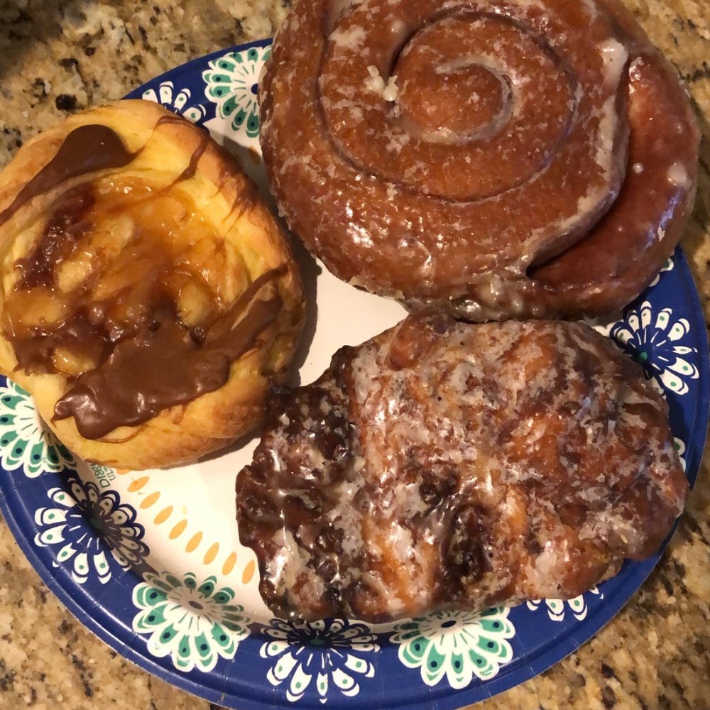 Delicious treats (caramel apple croissant, cinnamon roll, and apple fritter)