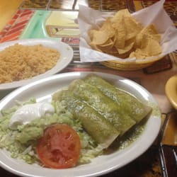 Enchilada Verdes w/rice. About to get yummy!