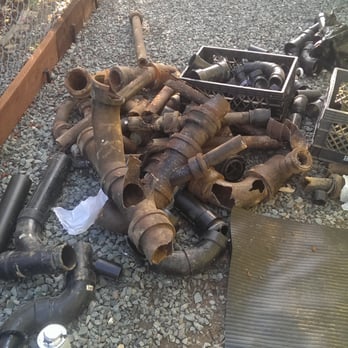 One Time Plumbing - This corroded mess (some of the pipes barely had any flow space left) use to carry water under the house. - Plumbing Near Me - Bonita, California