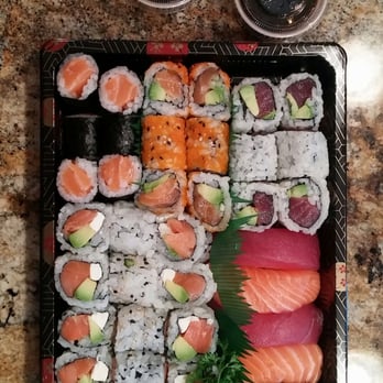 Sakura Japanese Restaurant - Two Philidelphia rolls, a Salmon roll, a Boston roll, an Alaskan roll, two pieces of salmon sushi, two of tuna, and an eel. - Japanese Near Me - Mchenry, Illinois Sakura Japanese Restaurant - Two Philidelphia rolls, a Salmon roll, a Boston roll, an Alaskan roll, two pieces of salmon sushi, two of tuna, and an eel. - Japanese Near Me - Mchenry, Illinois