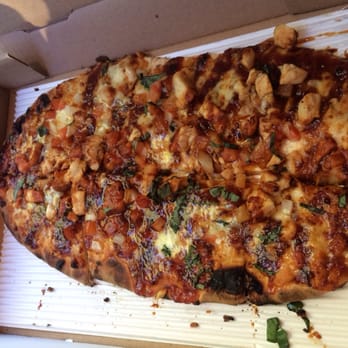 Joe's Farm Grill - BBQ Chicken pizza Minus the Bacon. They grill the pizza which gives it an amazing smoky flavor. - American Near Me - Gilbert, Arizona Joe's Farm Grill - BBQ Chicken pizza Minus the Bacon. They grill the pizza which gives it an amazing smoky flavor. - American Near Me - Gilbert, Arizona