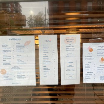 For All Things Good - Menus (4/24/2021) - A menu is posted on a glass window with horizontal wooden slats, listing food and beverage options, hours, and business information. - Cafes Near Me - Brooklyn, New York