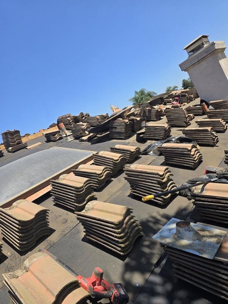 Slide of Richy’s Roofing Repair