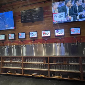 Chapter 11 Brewpub & Smokehouse - Florida breweries beer wall ! - Barbeque Near Me - Brandon, Florida