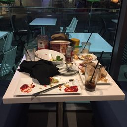 This table has been sitting like this for at least 20 minutes. Ew. This table has been sitting like this for at least 20 minutes. Ew.