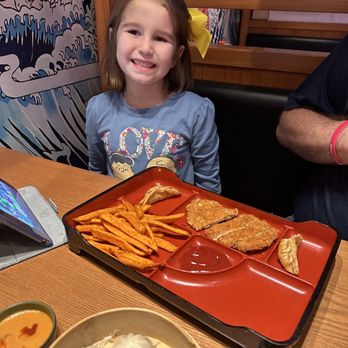 Iza Robata•Ramen - Steamed dumplings, and the chicken with sweet potato fries kids meal was a favorite for my daughter. Celebrating student of the month! - Ramen Near Me - Houston, Texas