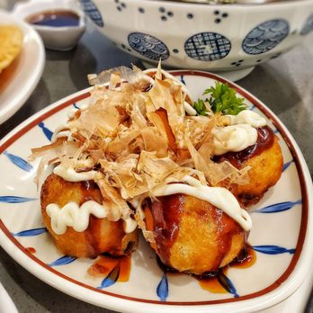 Ippon Ramen - a plate of food on a table - Ramen Near Me - Newmarket, Ontario Ippon Ramen - a plate of food on a table - Ramen Near Me - Newmarket, Ontario