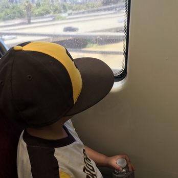 San Diego Trolley - My son enjoying the views of San Diego from the trolley - Public Transportation Near Me - San Diego, California San Diego Trolley - My son enjoying the views of San Diego from the trolley - Public Transportation Near Me - San Diego, California