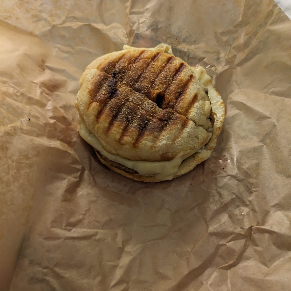 English muffin with egg, Swiss, and veggie sausage English muffin with egg, Swiss, and veggie sausage