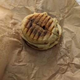 English muffin with egg, Swiss, and veggie sausage English muffin with egg, Swiss, and veggie sausage