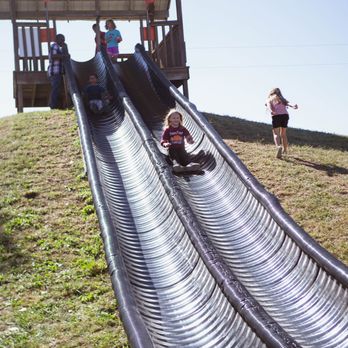 Roca Berry Farm - children sliding down a slide - Fruits & Veggies Near Me - Roca, Nebraska