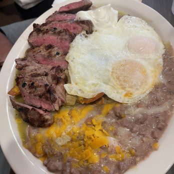 Cheliz - Chilaquiles with Steak. *asked for medium rare - Diners Near Me - Redlands, California