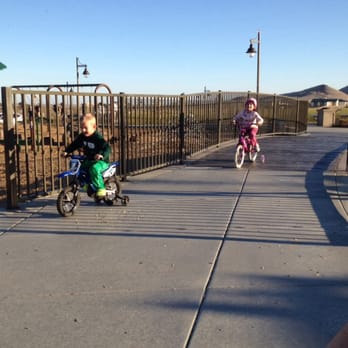 Cordelia Community Park - Sky and friends riding bikes at the park. - Parks Near Me - Fairfield, California