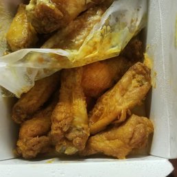 Honey mustard and red alert wings. Completely unappetizing including the feathers still stuck in the wing on the bottom right. Honey mustard and red alert wings. Completely unappetizing including the feathers still stuck in the wing on the bottom right.