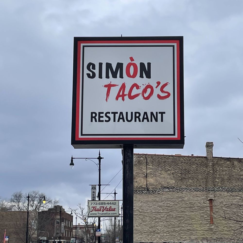 Simon Tacos - a sign for simon tacos's restaurant - Tacos Near Me - Chicago, Illinois Simon Tacos - a sign for simon tacos's restaurant - Tacos Near Me - Chicago, Illinois