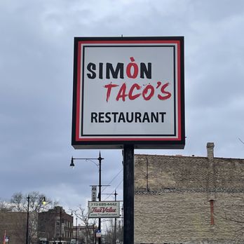 Simon Tacos - a sign for simon tacos's restaurant - Tacos Near Me - Chicago, Illinois Simon Tacos - a sign for simon tacos's restaurant - Tacos Near Me - Chicago, Illinois