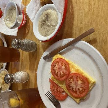 Log Cabin - "Smaller Eaters" section of the menu: 2 egg cheese omelette, tomatoes instead of hash-browns, biscuit & gravy, iced tea, - New Mexican Cuisine Near Me - Ruidoso, New Mexico Log Cabin - "Smaller Eaters" section of the menu: 2 egg cheese omelette, tomatoes instead of hash-browns, biscuit & gravy, iced tea, - New Mexican Cuisine Near Me - Ruidoso, New Mexico