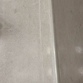 Sunscape Apartments - Sloppy seal in kitchen, ended up turning brown - Apartments Near Me - Roanoke, Virginia