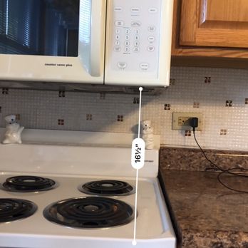 Brick by Brick Inspections - Microwave with ventilator should be 18" minimum over the range. - Home Inspectors Near Me - Western Springs, Illinois Brick by Brick Inspections - Microwave with ventilator should be 18" minimum over the range. - Home Inspectors Near Me - Western Springs, Illinois