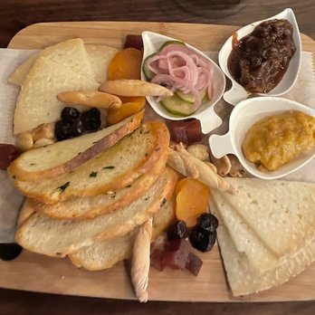 Palo Tapas Bar - Manchego cheese board with pickled onions, crunchy bread and breadsticks, apricot jam, caramelized onion spread, nuts, and cubed fruit - Tapas Bars Near Me - Providence, Rhode Island Palo Tapas Bar - Manchego cheese board with pickled onions, crunchy bread and breadsticks, apricot jam, caramelized onion spread, nuts, and cubed fruit - Tapas Bars Near Me - Providence, Rhode Island