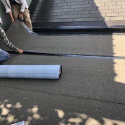 Friendly Restoration Services - Flat roof      experts