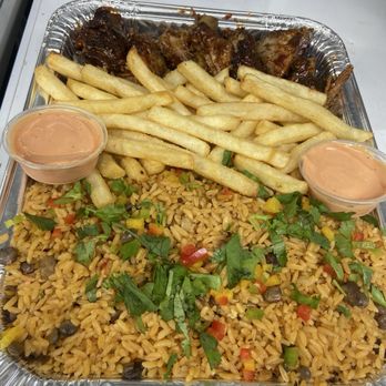 La Bandeja - Family-size tray featuring arroz con gandules (pigeon peas rice), crispy fries, BBQ glazed ribs, and our signature house mayo-ketchup sauce. - Food Trucks Near Me - Ladson, South Carolina