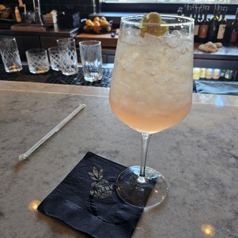 The Pinery - Sparked Up cocktail at the bar - American Near Me - Orlando, Florida The Pinery - Sparked Up cocktail at the bar - American Near Me - Orlando, Florida