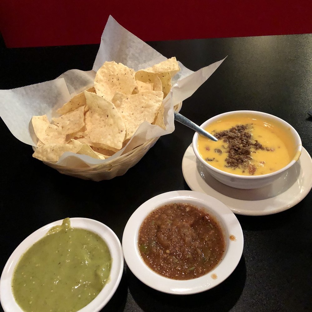 Cristobal Mexican Grill & Bar - Sauces with chips and chili con queso with ground beef - Mexican Near Me - Richmond, Texas Cristobal Mexican Grill & Bar - Sauces with chips and chili con queso with ground beef - Mexican Near Me - Richmond, Texas
