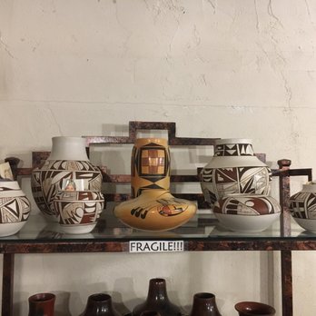 Teec Nos Pos Trading Post - a shelf of pottery - Grocery Near Me - Teec Nos Pos, Arizona Teec Nos Pos Trading Post - a shelf of pottery - Grocery Near Me - Teec Nos Pos, Arizona