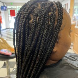 Mimi African Hair Braiding - Book your appointment with us to get your hair braided.