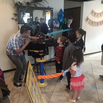 Don's Twisted Creations - Demonstrating the bow and arrow balloon - Party & Event Planning Near Me