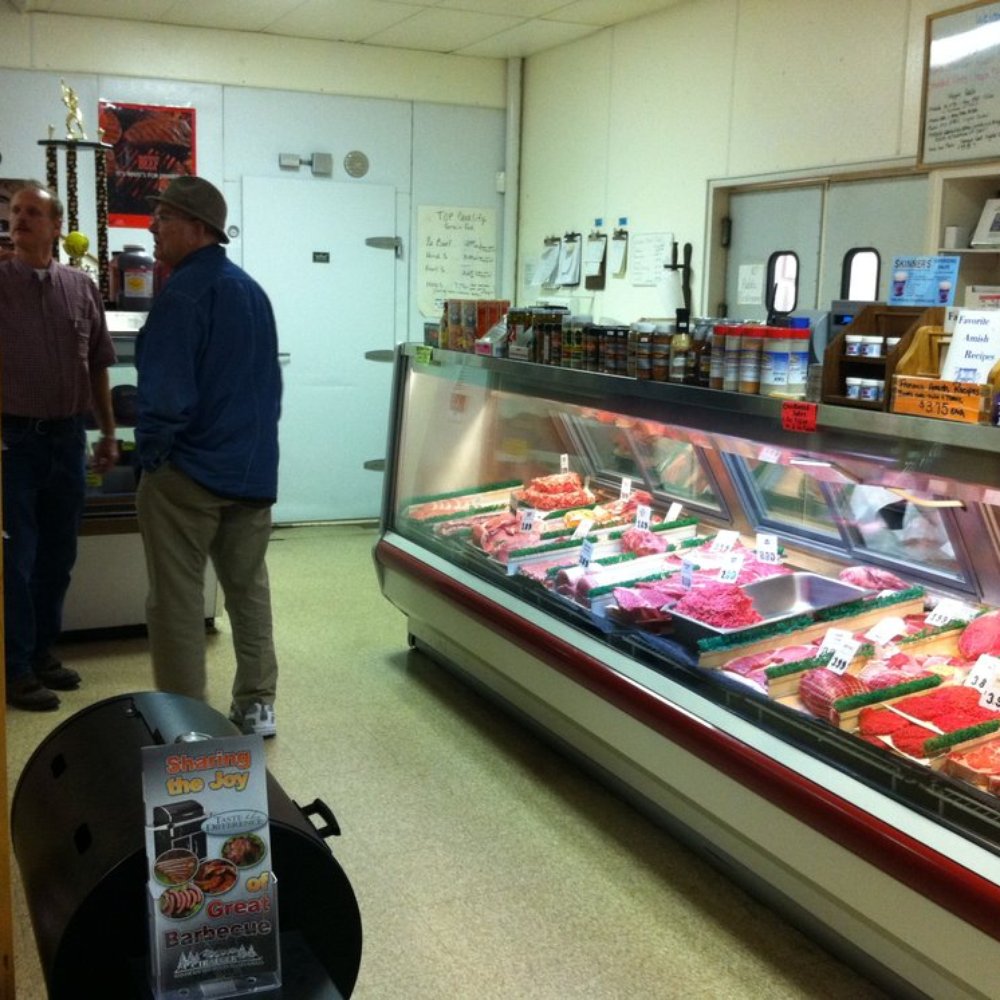 Dutch Valley Meats - a man and a woman in a butcher shop - Meat Shops Near Me - Arthur, Illinois
