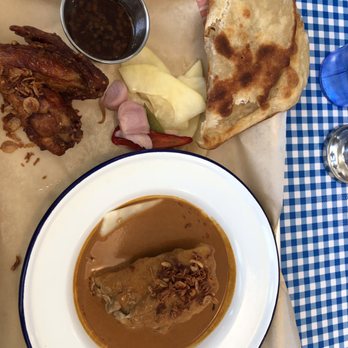 Hat Yai - Braised chicken thigh in curry w/ extra fried wing & roti. Killer. - Thai Near Me - Portland, Oregon