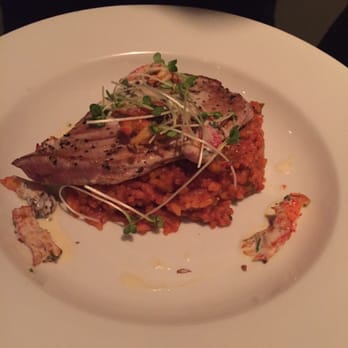 Eli's Table - Ahi over "red rice" risotto. Lukewarm and a tad over cooked. A victim of the ValentinesDay weekend crowd. - Southern Near Me - Charleston, South Carolina Eli's Table - Ahi over "red rice" risotto. Lukewarm and a tad over cooked. A victim of the ValentinesDay weekend crowd. - Southern Near Me - Charleston, South Carolina