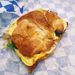 Bacon egg cheese Croissant breakfast sandwich Bacon egg cheese Croissant breakfast sandwich