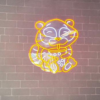 Siri Bubble Tea - a neon sign on a brick wall - Bubble Tea Near Me - Murfreesboro, Tennessee