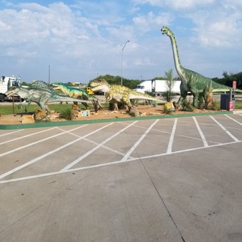 Tesla Supercharger - Mini dinosaurs display - EV Charging Stations Near Me - Henrietta, Texas Tesla Supercharger - Mini dinosaurs display - EV Charging Stations Near Me - Henrietta, Texas
