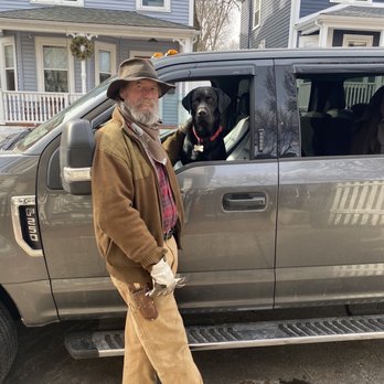 Cutler Tree - Chris, his dog Ghost and their vehicle. - Tree Services Near Me
