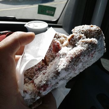 Allie's Donuts - A coconut jelly stick: It's so heavy, "it's like a suitcase," my coworker said. - Donuts Near Me - North Kingstown, Rhode Island Allie's Donuts - A coconut jelly stick: It's so heavy, "it's like a suitcase," my coworker said. - Donuts Near Me - North Kingstown, Rhode Island