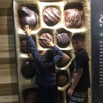 Ethel M Chocolates - Kids having fun at the chocolate wall - Botanical Gardens Near Me - Henderson, Nevada Ethel M Chocolates - Kids having fun at the chocolate wall - Botanical Gardens Near Me - Henderson, Nevada