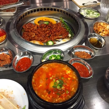 Tomukun Korean Barbeque - Spicy pork bbq on the grill and spicy beef brisket soup. - Korean Near Me - Ann Arbor, Michigan Tomukun Korean Barbeque - Spicy pork bbq on the grill and spicy beef brisket soup. - Korean Near Me - Ann Arbor, Michigan